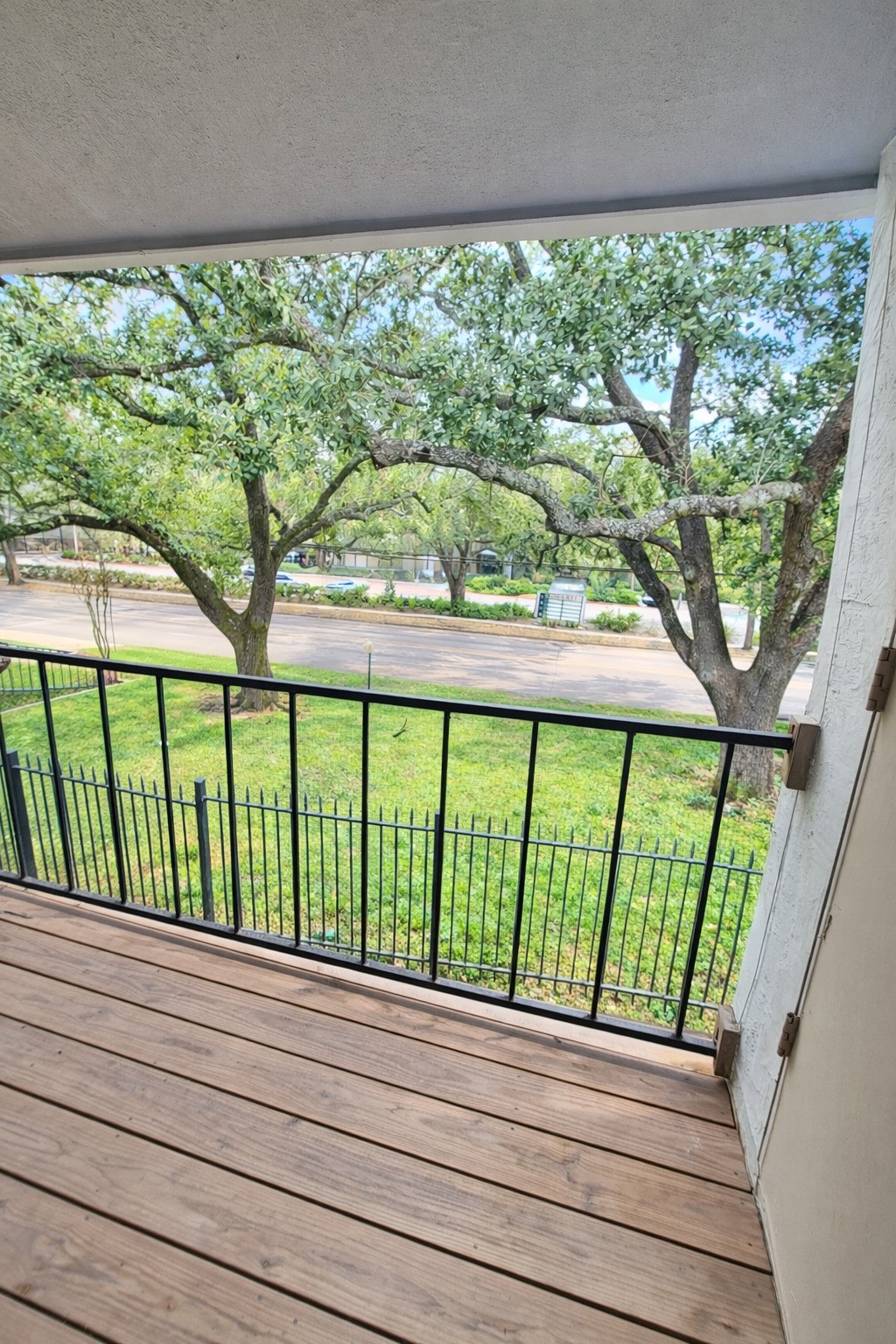 2425 Augusta Drive, Unit 4 Houston, TX 77057 - Photo 7 of 12 a view of a wooden deck