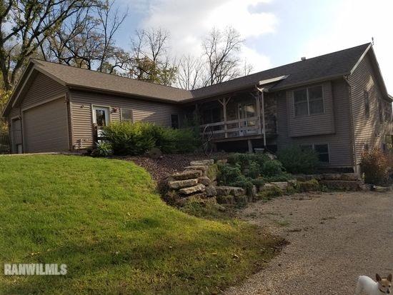 1519 North Hoppe Road Elizabeth, IL 61028 - Photo 1 of 1 a view of a house with backyard and garden