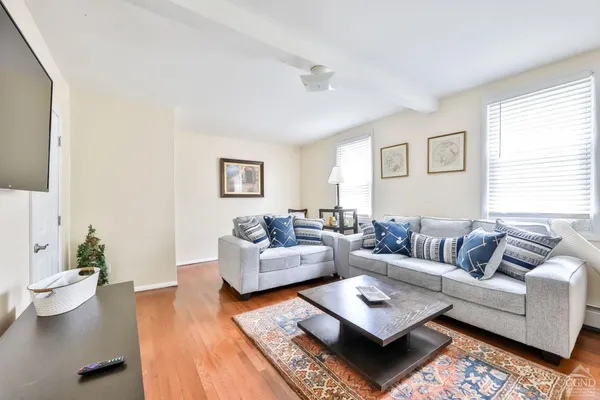 a living room with furniture and a couch