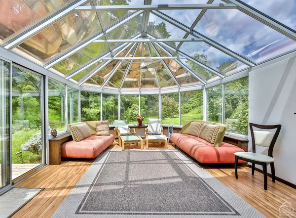 a outdoor space with patio lots of furniture and umbrella