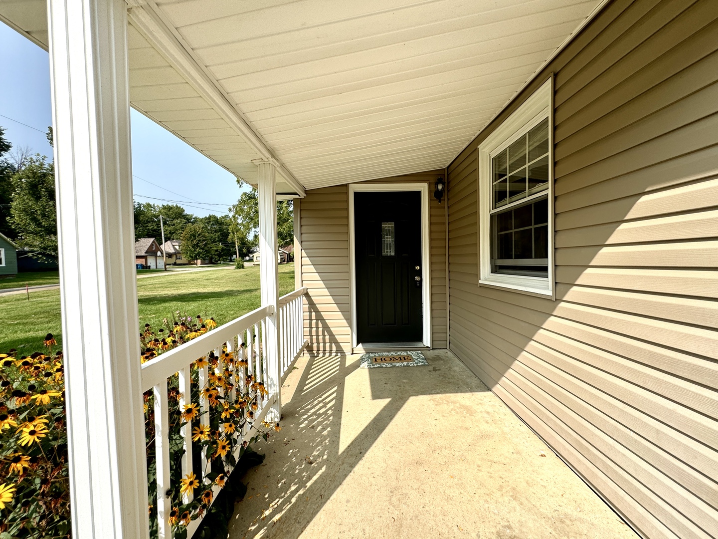 102 Cottage Avenue La Moille, IL 61330 - Photo 3 of 29 a view of balcony with wooden floor and fence