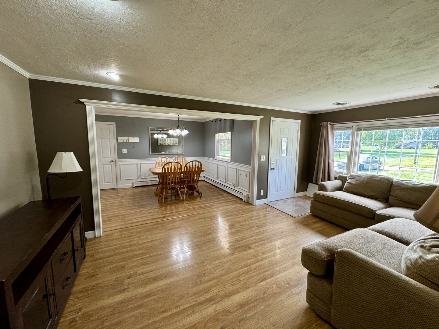 102 Cottage Avenue La Moille, IL 61330 - Photo 7 of 29 a living room with furniture and a large window