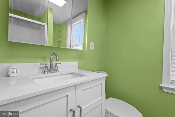 a view of staircase with white walls