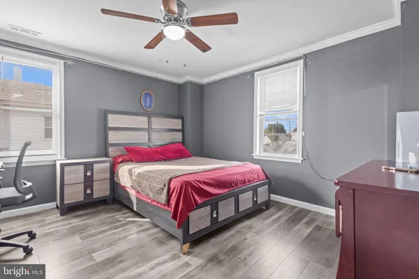 a bedroom with a bed and a cabinets