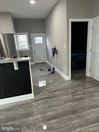 an aerial view of a house with roof deck