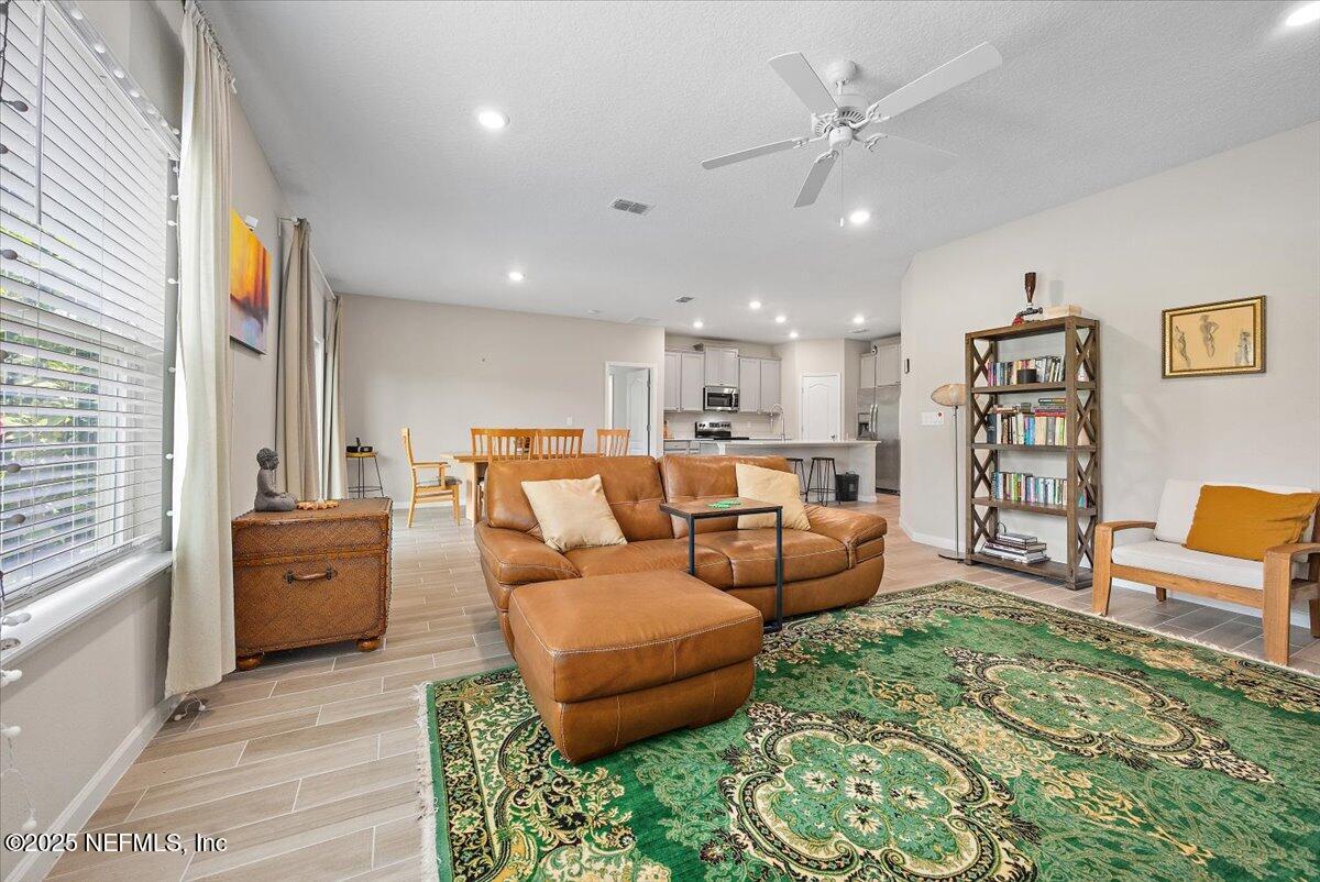 438 Stone Arbor Lane St. Augustine, FL 32086 - Photo 3 of 16 11-Family Room to Kitchen