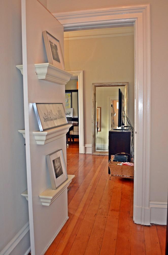1219 Laguna Street Santa Barbara, CA 93101 - Photo 13 of 25 a living room with a couch and a wooden floor