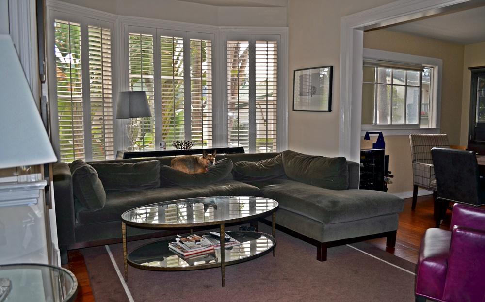 1219 Laguna Street Santa Barbara, CA 93101 - Photo 16 of 25 a living room with furniture and a floor to ceiling window