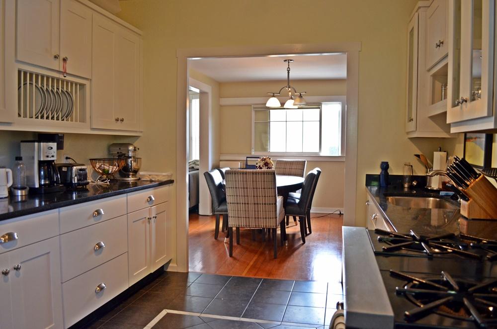 1219 Laguna Street Santa Barbara, CA 93101 - Photo 21 of 25 a view of a dining room with furniture and chandelier