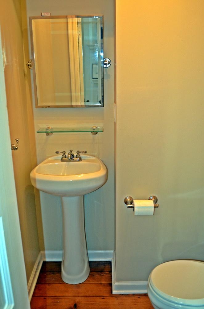 1219 Laguna Street Santa Barbara, CA 93101 - Photo 23 of 25 a bathroom with a sink toilet and mirror