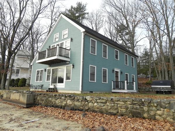 2 Birchmeadow Road Amesbury, MA 01913 - Photo 2 of 22 a front view of a house with garden