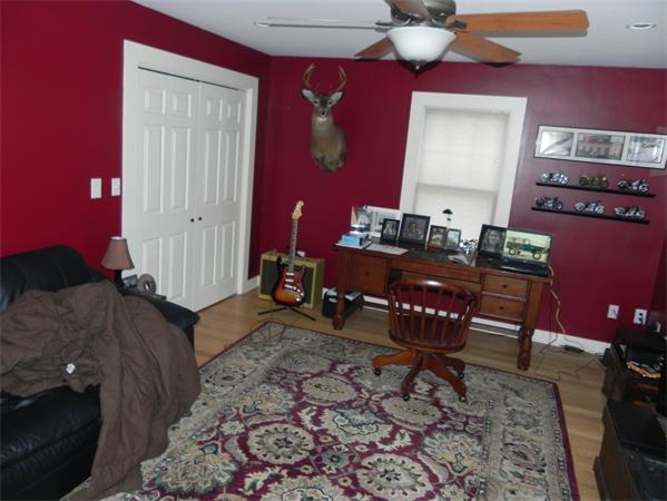 2 Birchmeadow Road Amesbury, MA 01913 - Photo 9 of 22 a bedroom with furniture and wooden floor
