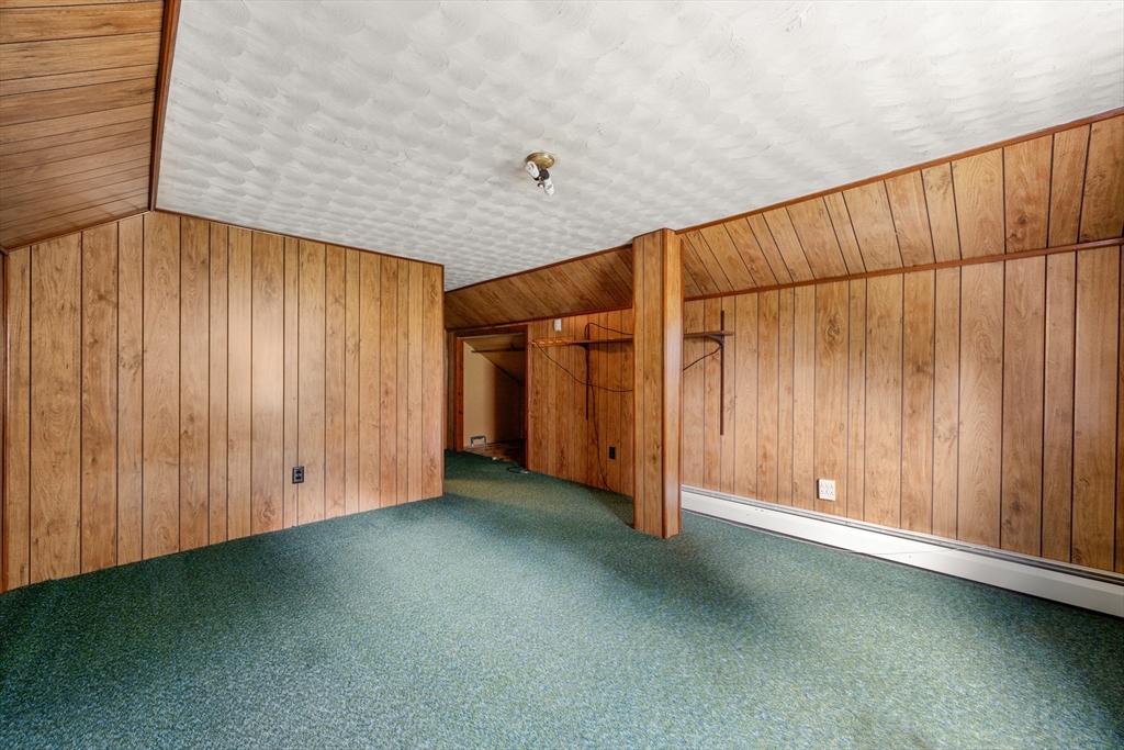 51 Spofford Road Worcester, MA 01607 - Photo 16 of 20 an empty room with a wooden door