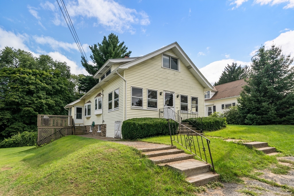 51 Spofford Road Worcester, MA 01607 - Photo 2 of 20 a front view of a house with a yard