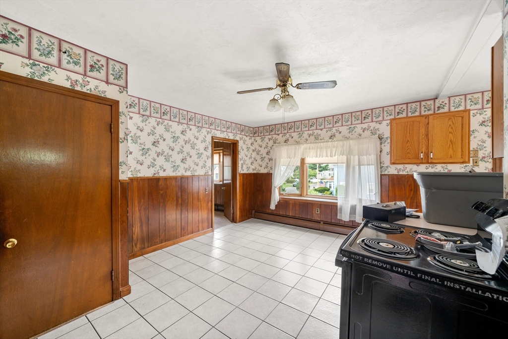 51 Spofford Road Worcester, MA 01607 - Photo 4 of 20 a kitchen with stainless steel appliances granite countertop a stove a sink and a refrigerator