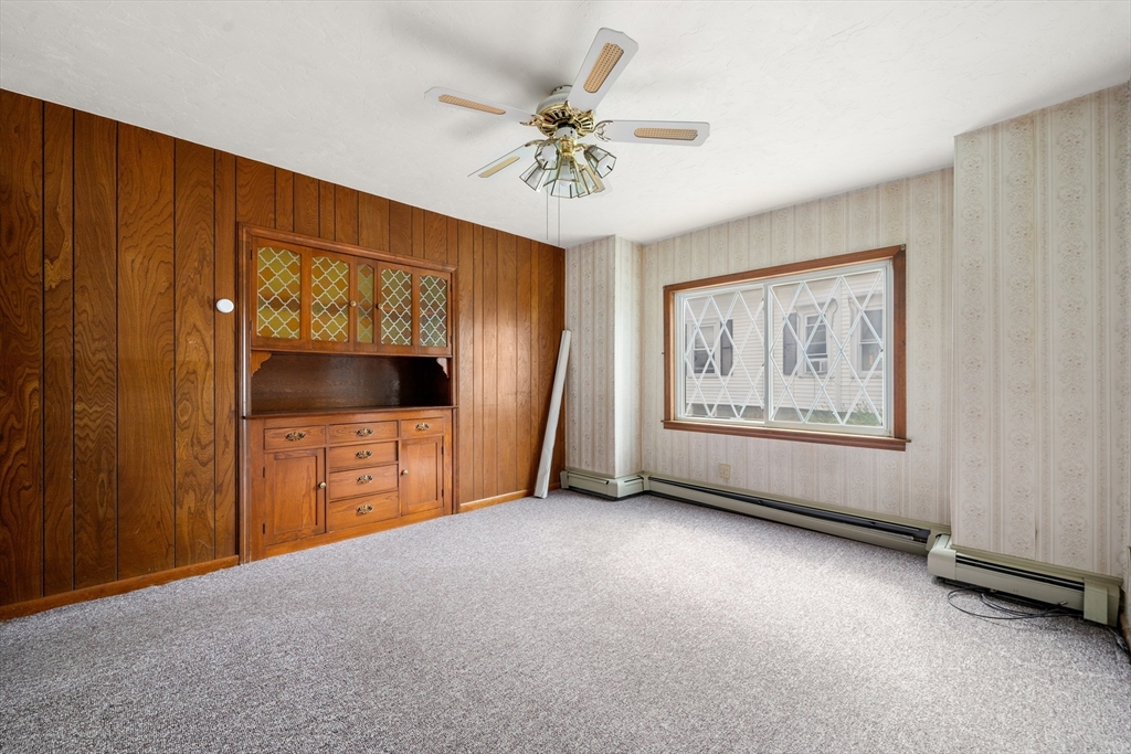 51 Spofford Road Worcester, MA 01607 - Photo 10 of 20 a view of a livingroom with a ceiling fan and window
