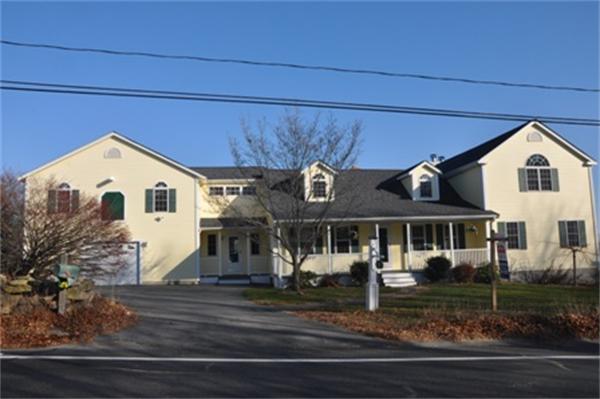 55 Perry Hill Road Acushnet, MA 02743 - Photo 1 of 13 a front view of a house with a yard