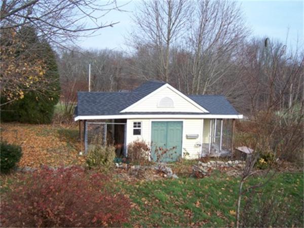 55 Perry Hill Road Acushnet, MA 02743 - Photo 4 of 13 a front view of house with yard and green space