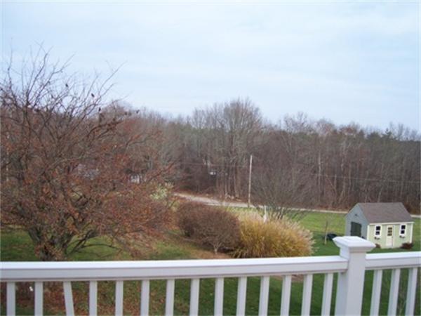 55 Perry Hill Road Acushnet, MA 02743 - Photo 6 of 13 a view of a green yard
