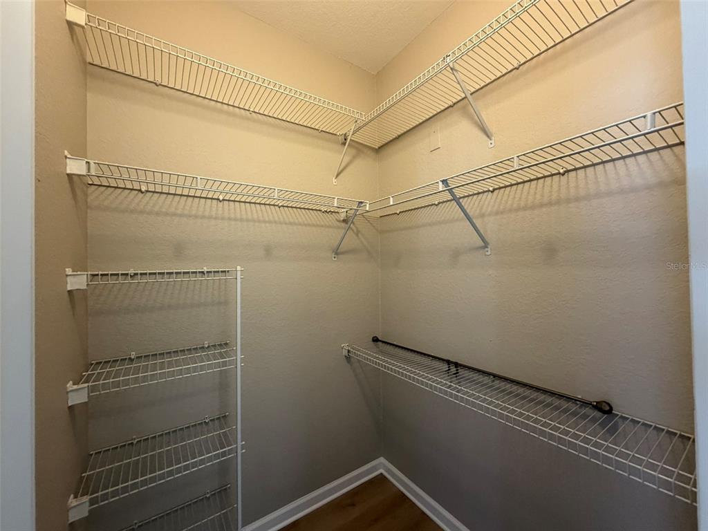13524 Turtle Marsh Loop, Unit 621 Orlando, FL 32837 - Photo 9 of 14 a view of a room with racks on the wall