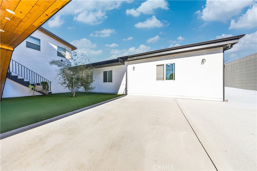 20200 Lassen Street Chatsworth, CA 91311 - Photo 16 of 32 a view of house with yard