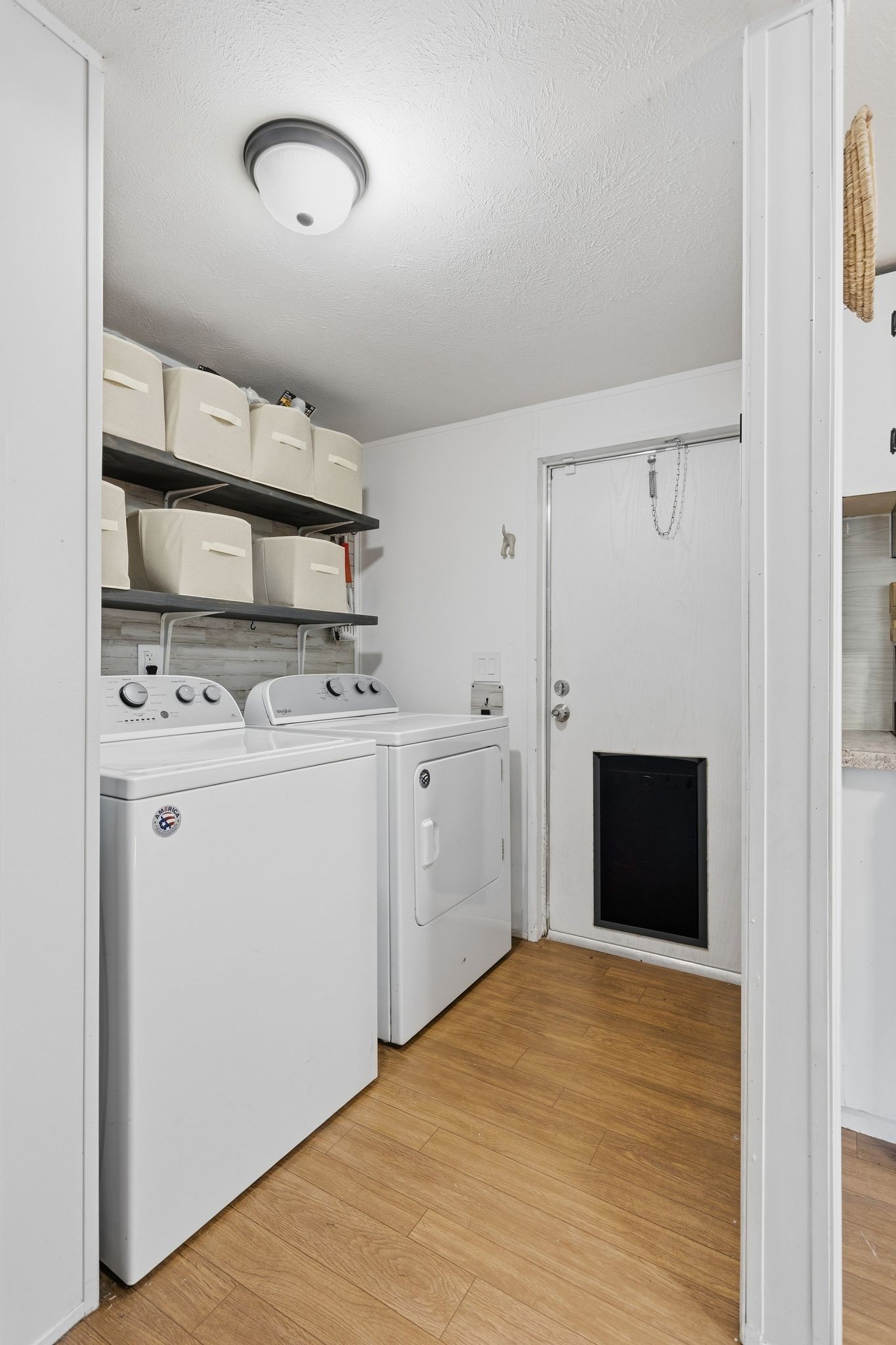 3204 Grizzly Road Culleoka, TN 38451 - Photo 17 of 25 a view of storage and utility room with washer and dryer