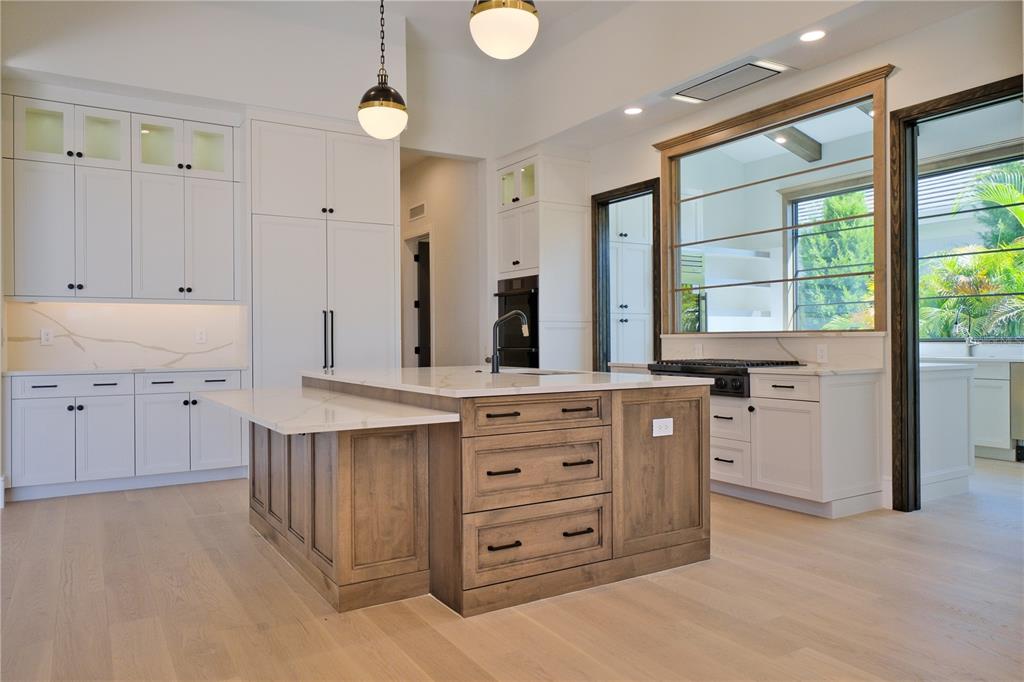 14758 Como Circle Lakewood Ranch, FL 34202 - Photo 15 of 85 a spacious bathroom with double vanity and a large mirror