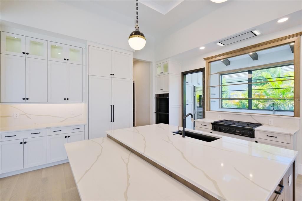 14758 Como Circle Lakewood Ranch, FL 34202 - Photo 16 of 85 a bedroom with a bed and a large window