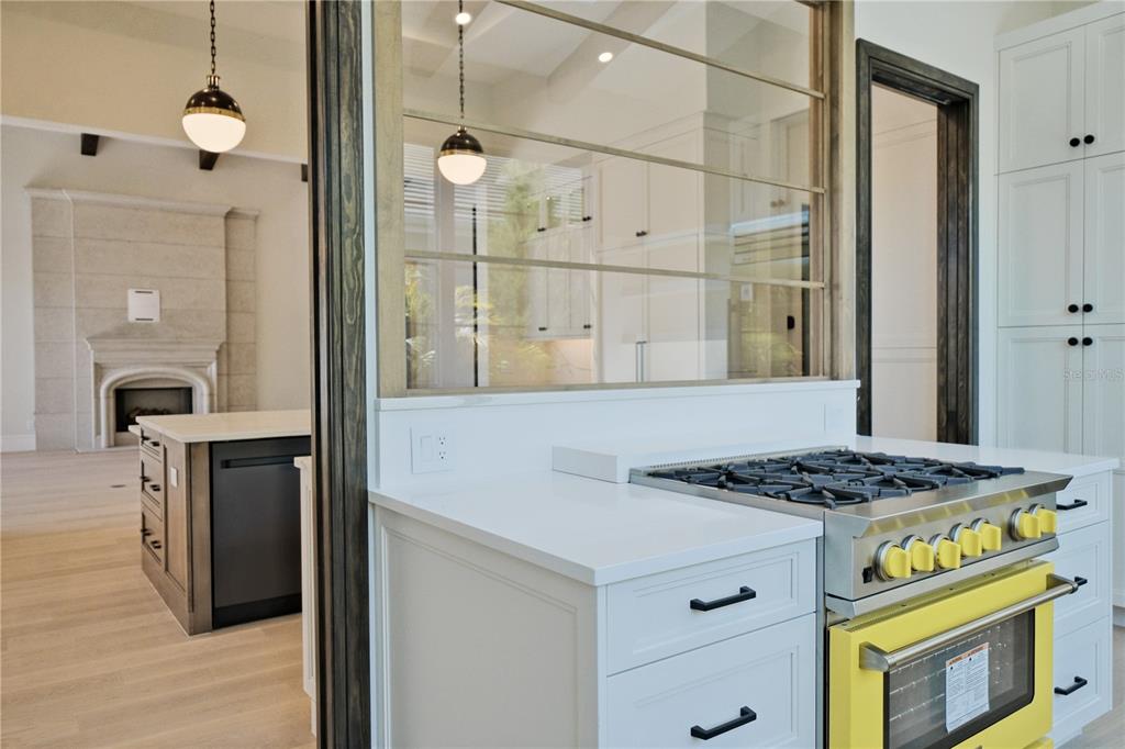 14758 Como Circle Lakewood Ranch, FL 34202 - Photo 19 of 85 a kitchen with stainless steel appliances granite countertop a stove a sink and a refrigerator