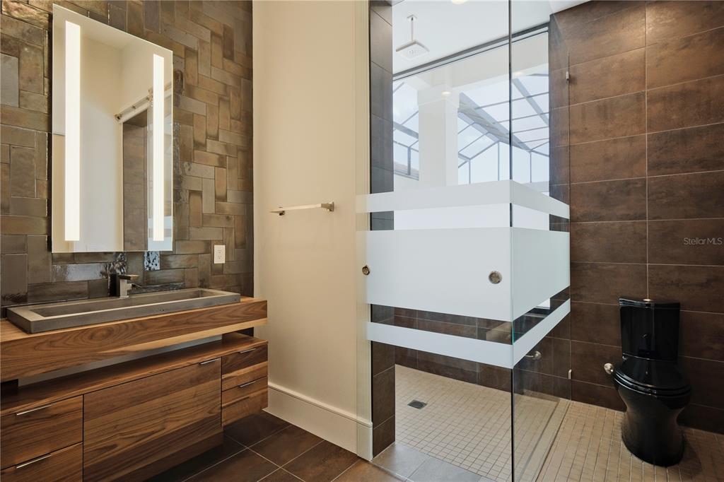 14758 Como Circle Lakewood Ranch, FL 34202 - Photo 45 of 85 a bathroom with a sink and a mirror