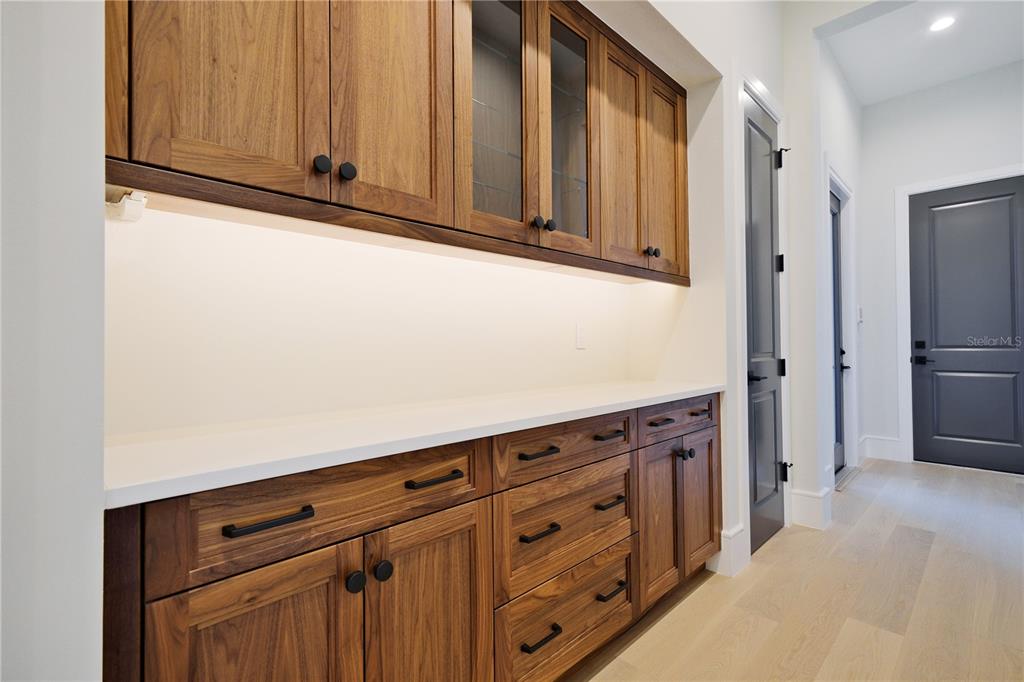 14758 Como Circle Lakewood Ranch, FL 34202 - Photo 54 of 85 a kitchen with stainless steel appliances a refrigerator and cabinets