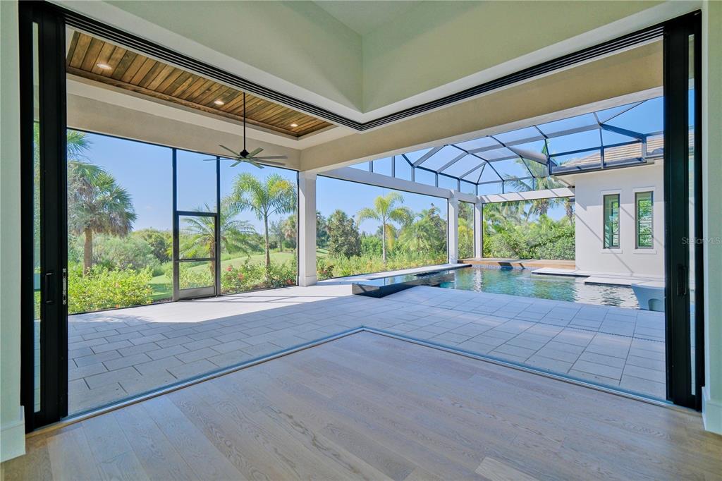 14758 Como Circle Lakewood Ranch, FL 34202 - Photo 64 of 85 a view of a house with porch and outdoor space