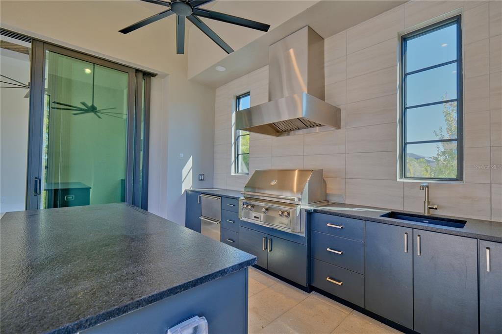 14758 Como Circle Lakewood Ranch, FL 34202 - Photo 67 of 85 a kitchen with cabinets and window