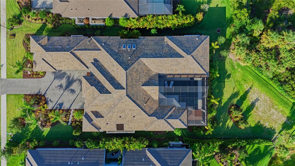 14758 Como Circle Lakewood Ranch, FL 34202 - Photo 73 of 85 an aerial view of a house with a yard and potted plants