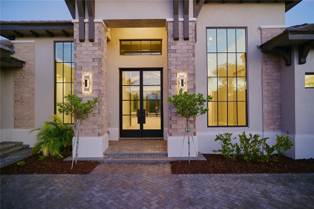 14758 Como Circle Lakewood Ranch, FL 34202 - Photo 74 of 85 a front view of a house having yard