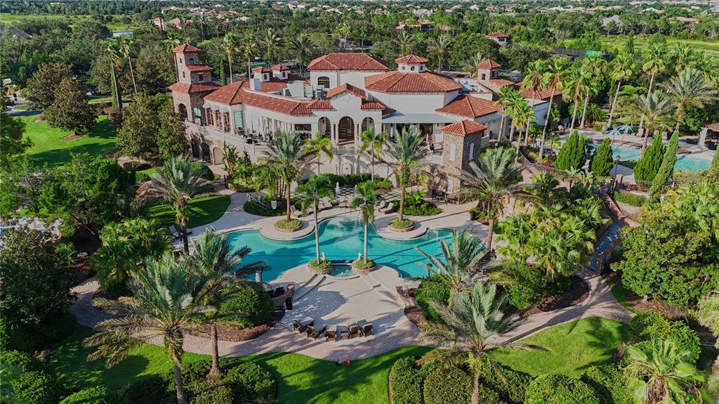 14758 Como Circle Lakewood Ranch, FL 34202 - Photo 80 of 85 an aerial view of residential houses with outdoor space and trees all around