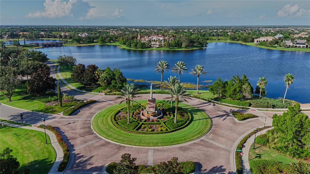 14758 Como Circle Lakewood Ranch, FL 34202 - Photo 83 of 85 a view of a swimming pool with a yard