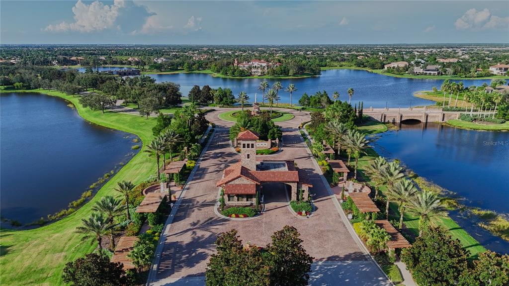 14758 Como Circle Lakewood Ranch, FL 34202 - Photo 84 of 85 an aerial view of a house with a lake view