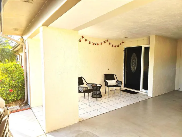 a building outdoor space with patio furniture