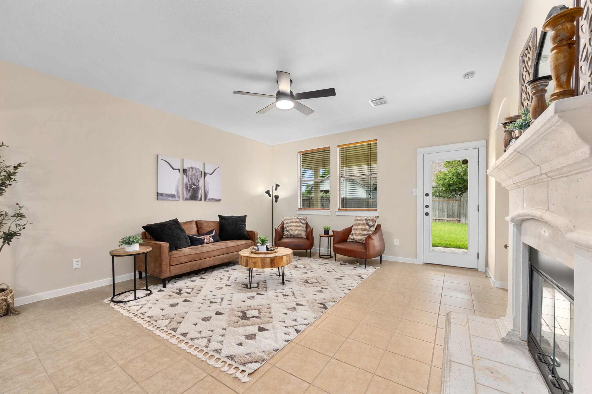 105 Rosebud Lane Georgetown, TX 78633 - Photo 10 of 37 a living room with furniture and a fireplace