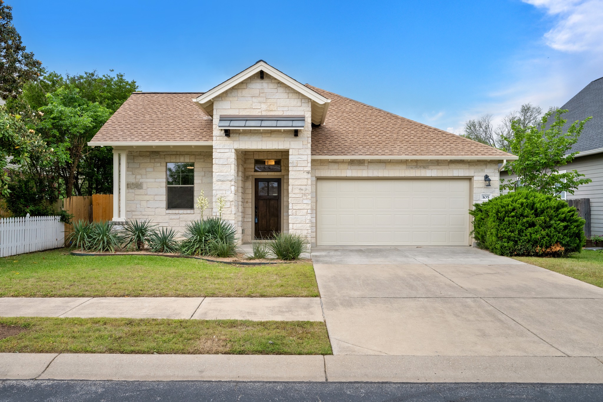 105 Rosebud Lane Georgetown, TX 78633 - Photo 2 of 37 a front view of a house with a yard