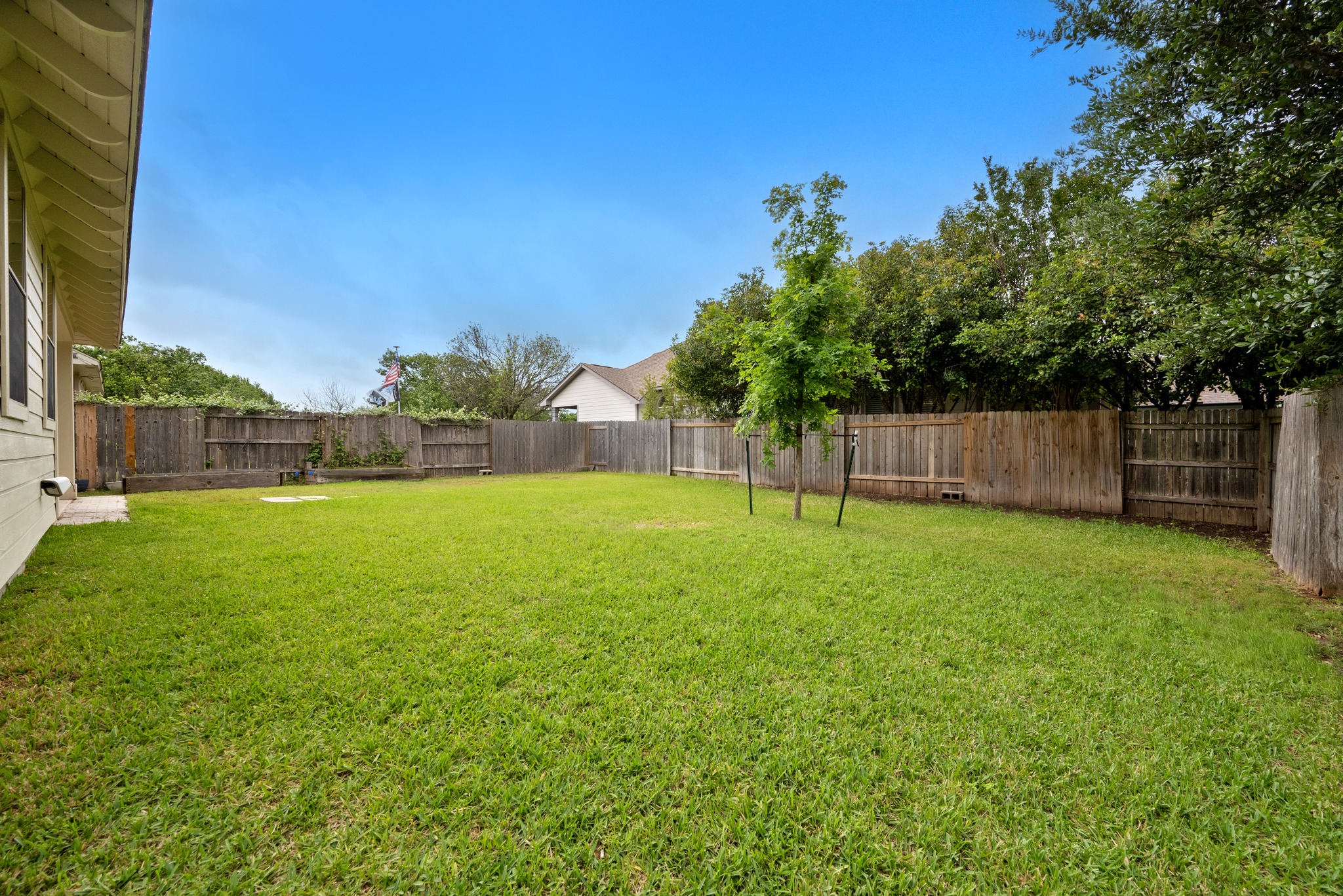 105 Rosebud Lane Georgetown, TX 78633 - Photo 21 of 37 a view of a yard with a trampoline