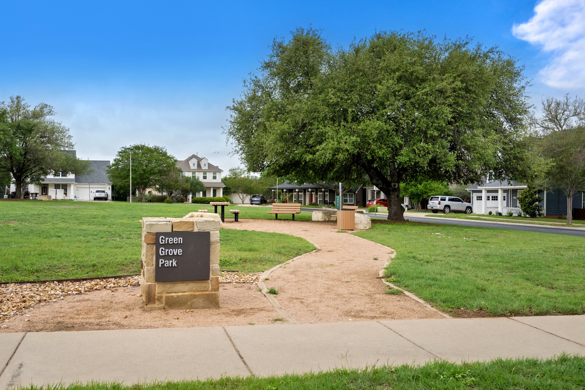 105 Rosebud Lane Georgetown, TX 78633 - Photo 30 of 37 a view of a park with bench and trees