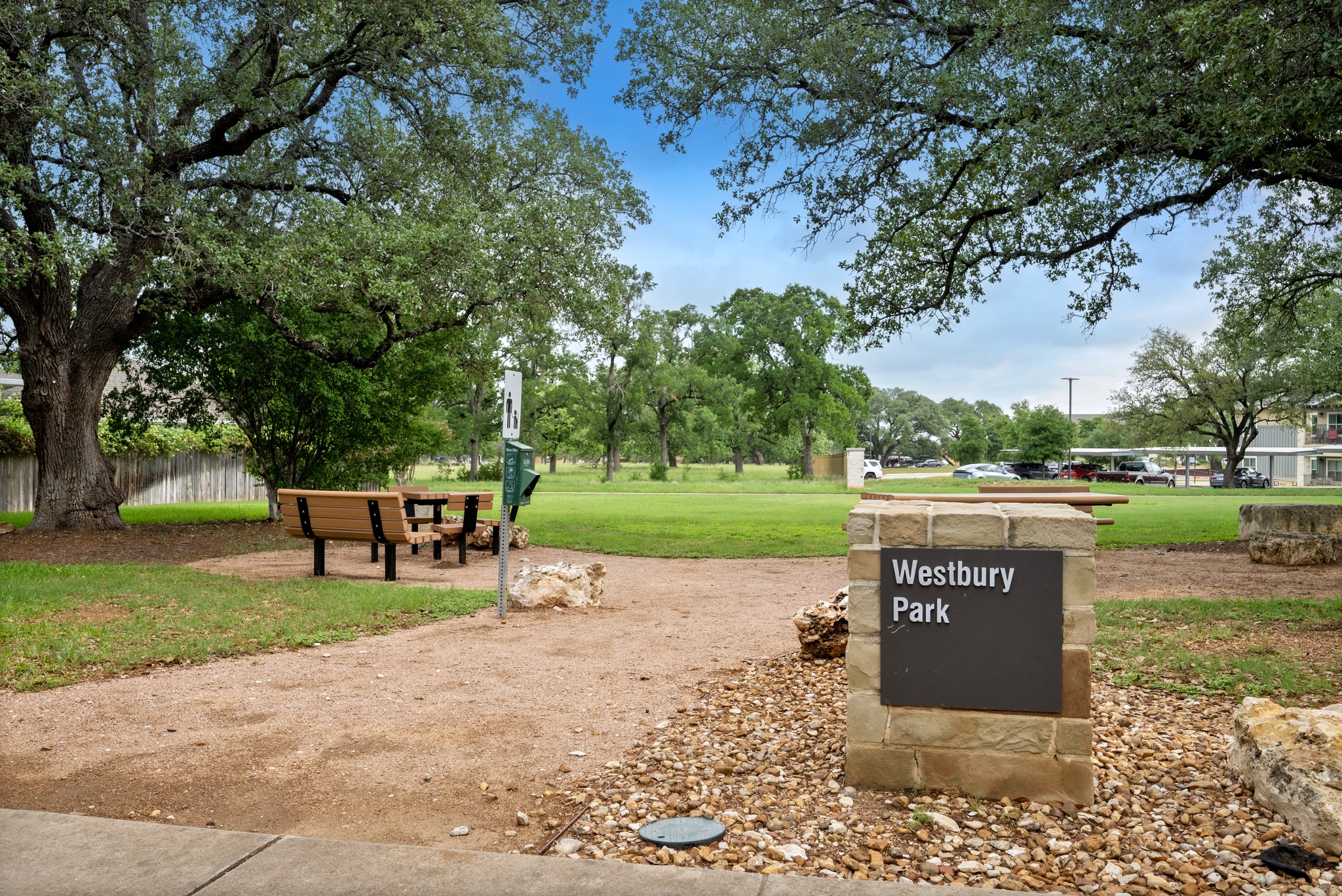 105 Rosebud Lane Georgetown, TX 78633 - Photo 31 of 37 a view of a park with bench and trees