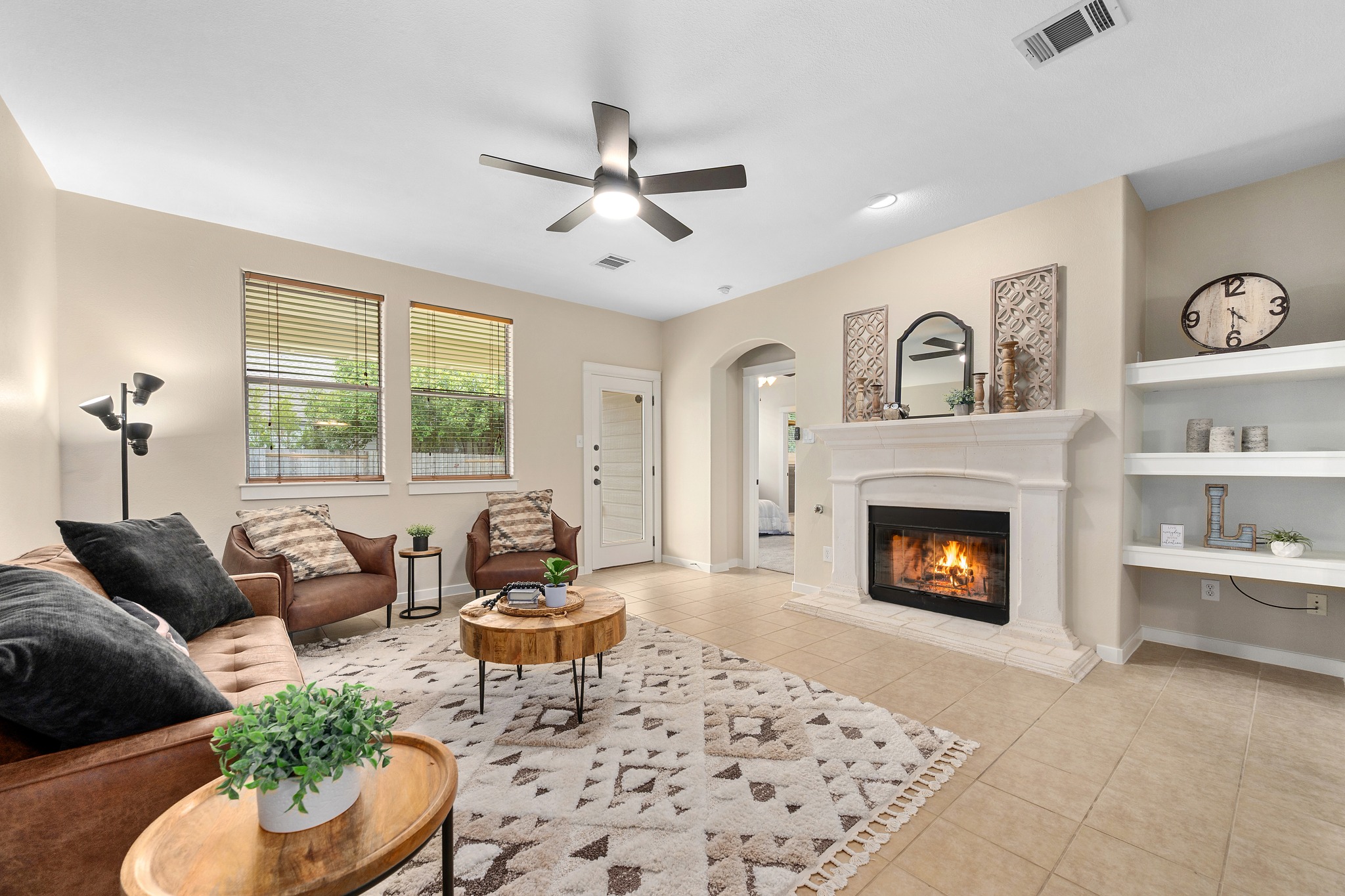 105 Rosebud Lane Georgetown, TX 78633 - Photo 4 of 37 a living room with furniture and a fireplace