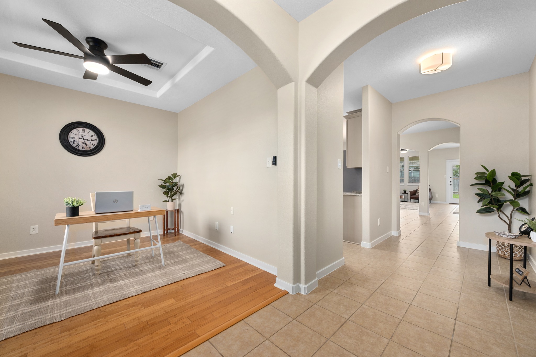 105 Rosebud Lane Georgetown, TX 78633 - Photo 7 of 37 a view of a livingroom with furniture and a table wooden floor
