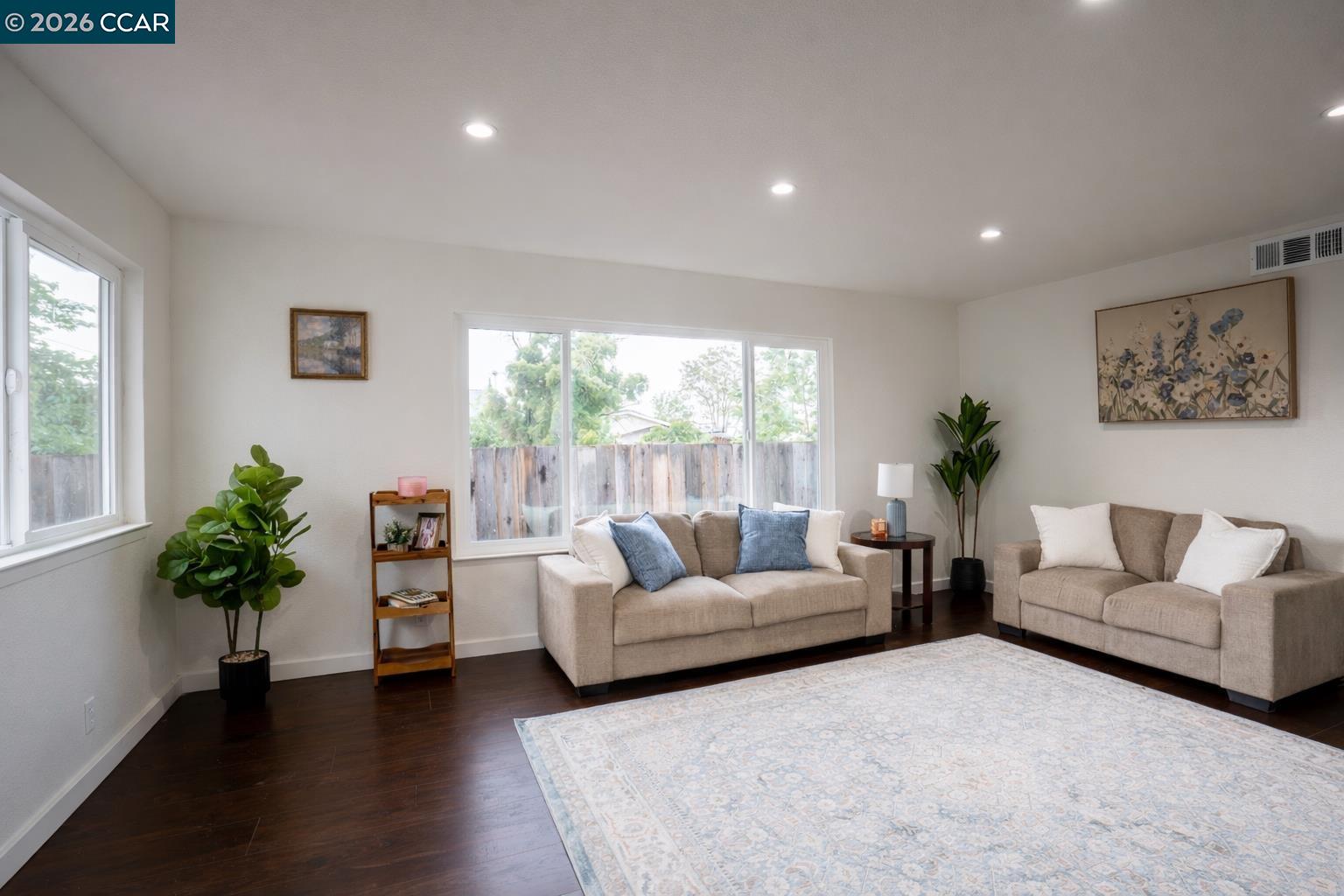 58 Solano Avenue Bay Point, CA 94565 - Photo 2 of 23 a living room with furniture and a large window