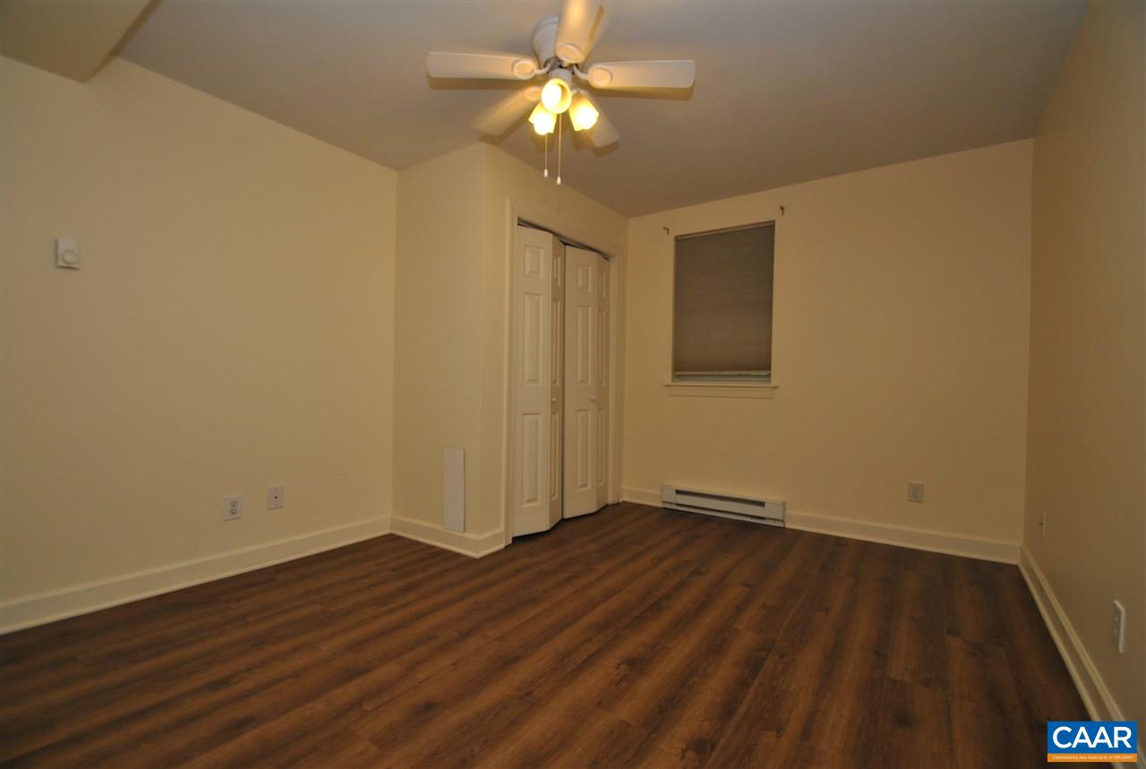 114 Elkhorn Road Charlottesville, VA 22903 - Photo 21 of 23 a view of empty room with wooden floor
