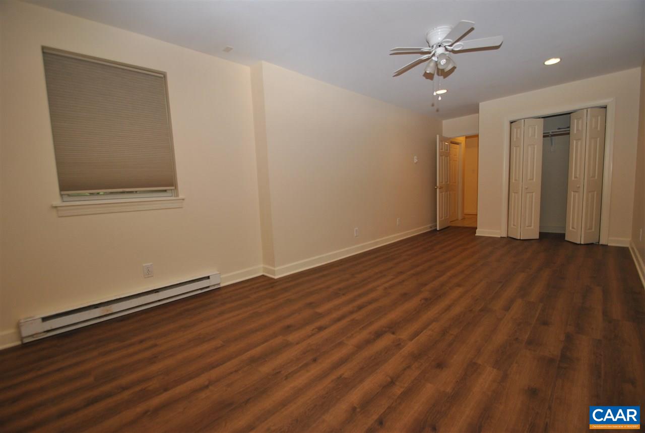 114 Elkhorn Road Charlottesville, VA 22903 - Photo 23 of 23 a view of an empty room with wooden floor
