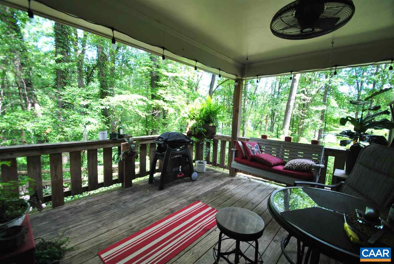 114 Elkhorn Road Charlottesville, VA 22903 - Photo 5 of 23 a view of a chairs and table in patio with potted plants